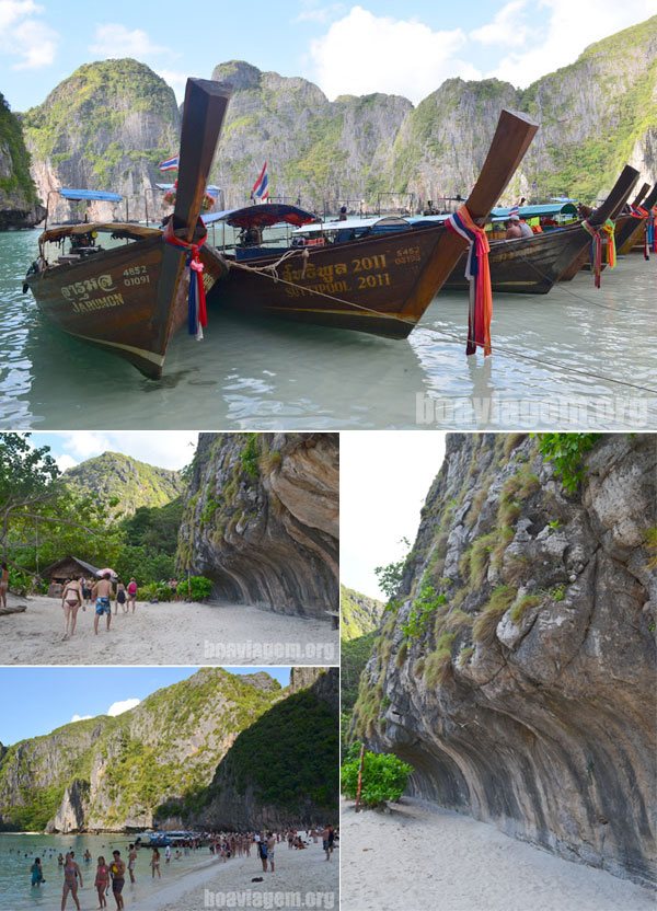 Embarcações tailandesas e turistas na praia de Maya Bay