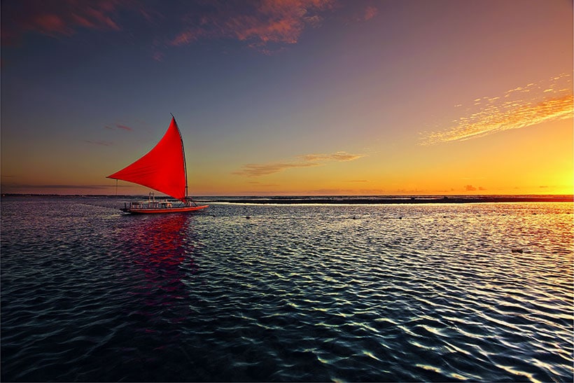 Passeio de jangada no pôr do sol em Porto de Galinhas